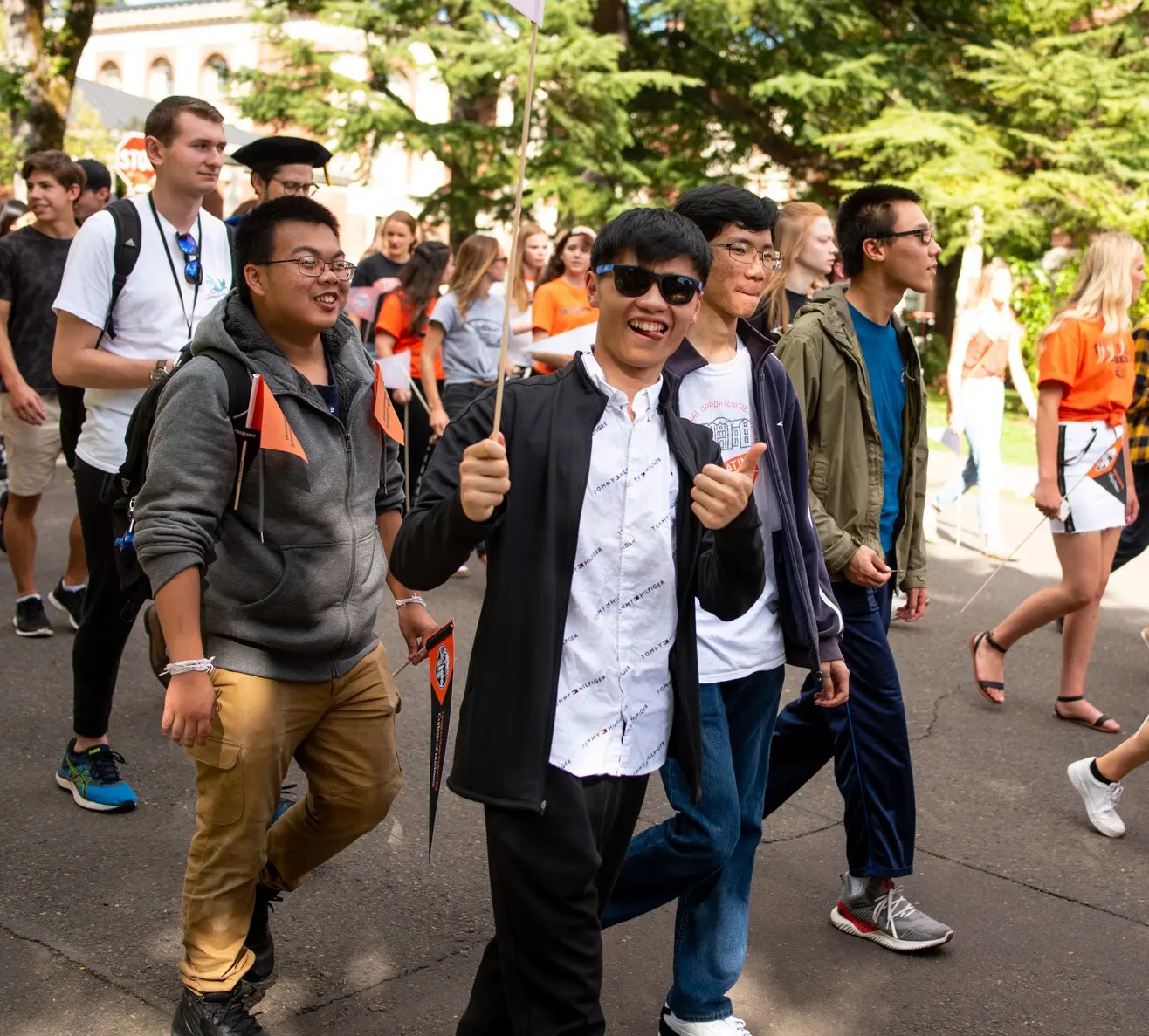International students walking in campus parade
